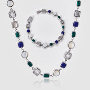 Necklace with multicolored gemstones on a white background