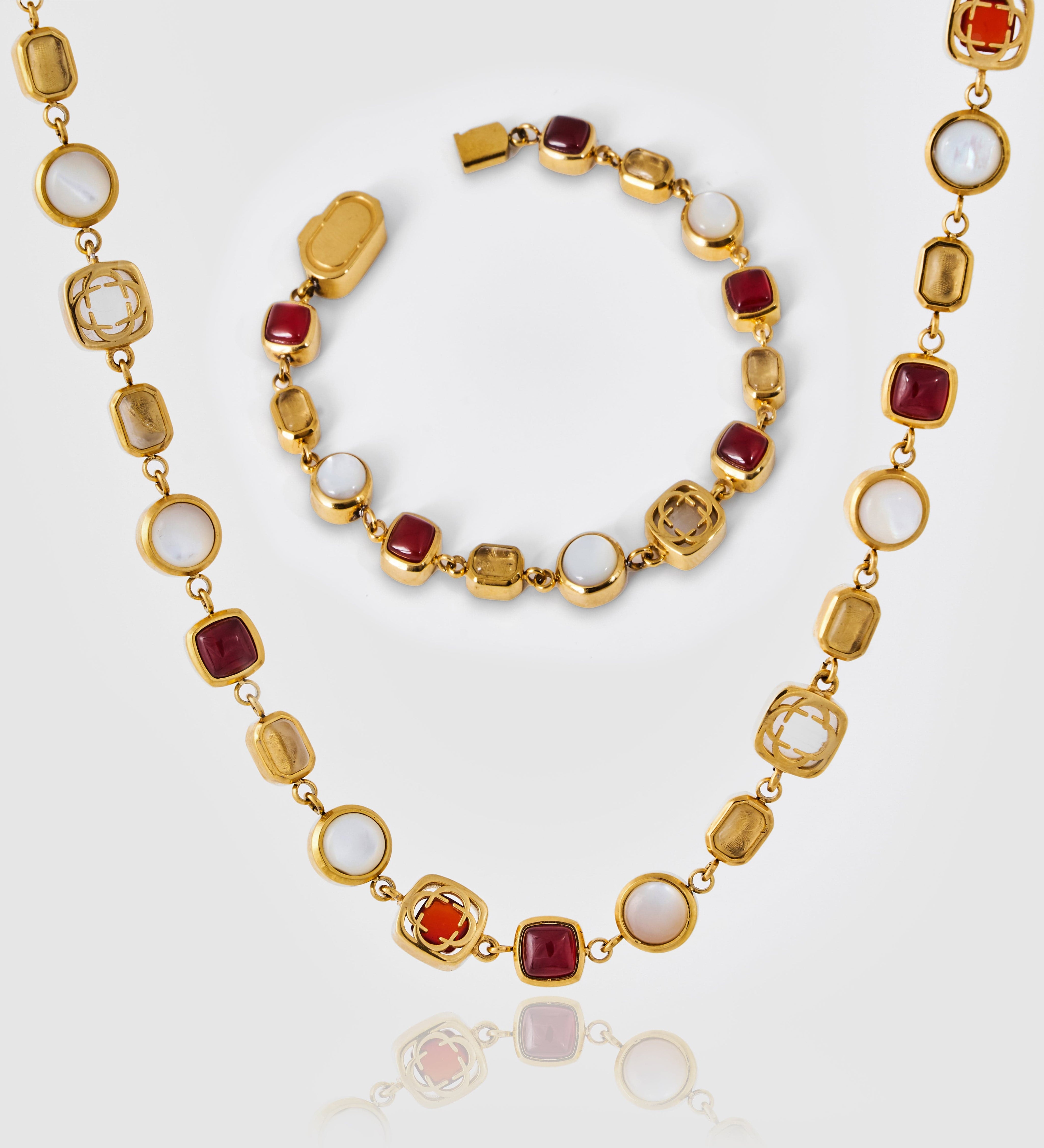 Red-Crystal-Gemstone-Set-Gold.jpg